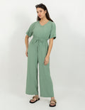 Jumpsuit verde agua con smock en cintura
