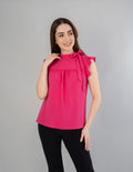 Blusa con detalle en cuello (disponible en fiusha / ivory)