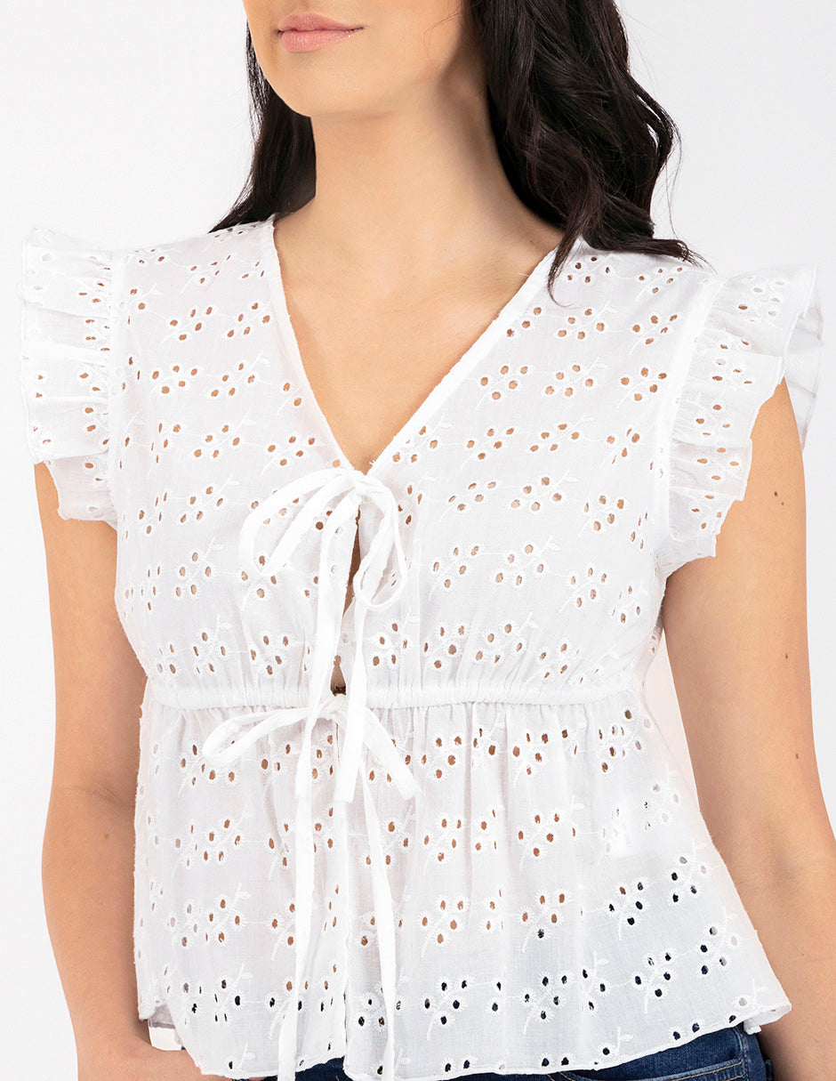 Blusa de encaje blanco de popelina bordada con diseño floral