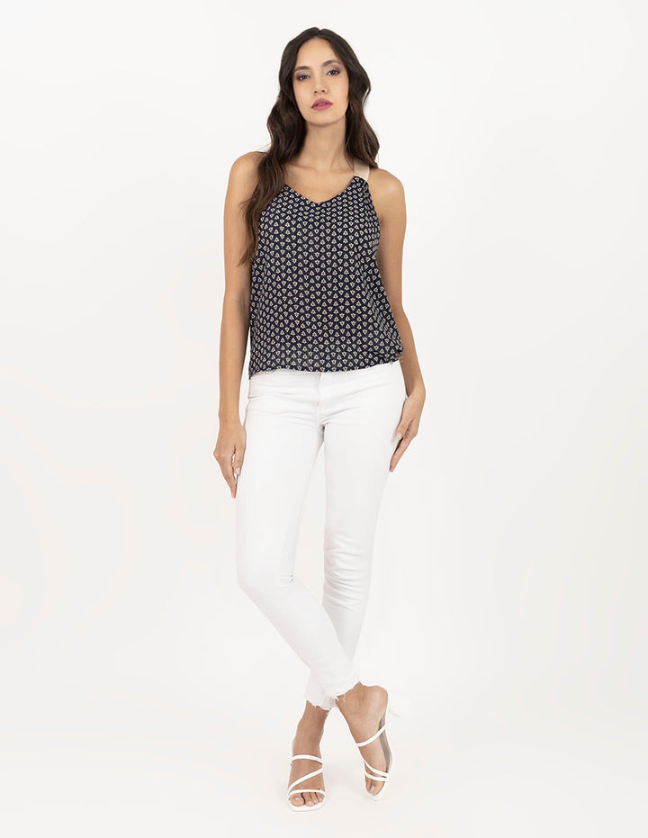 Blusa azul marino estampada con tirantes en contraste color crema