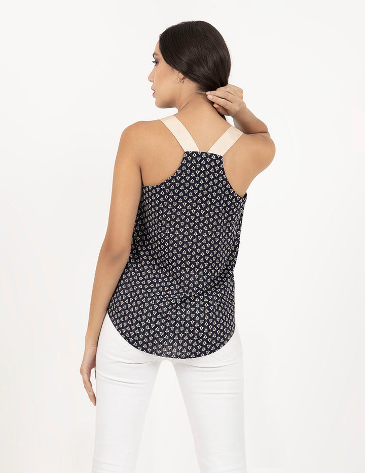 Blusa azul marino estampada con tirantes en contraste color crema