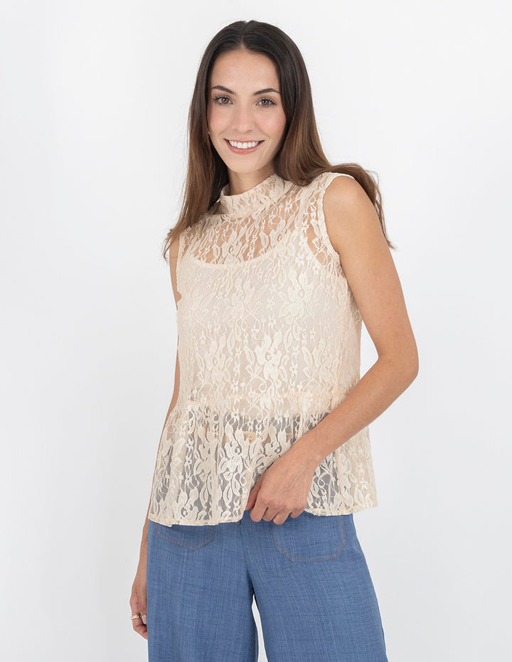 Blusa crema sin mangas y encaje floral