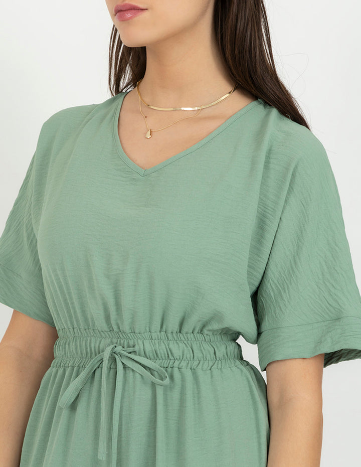 Jumpsuit verde agua con smock en cintura