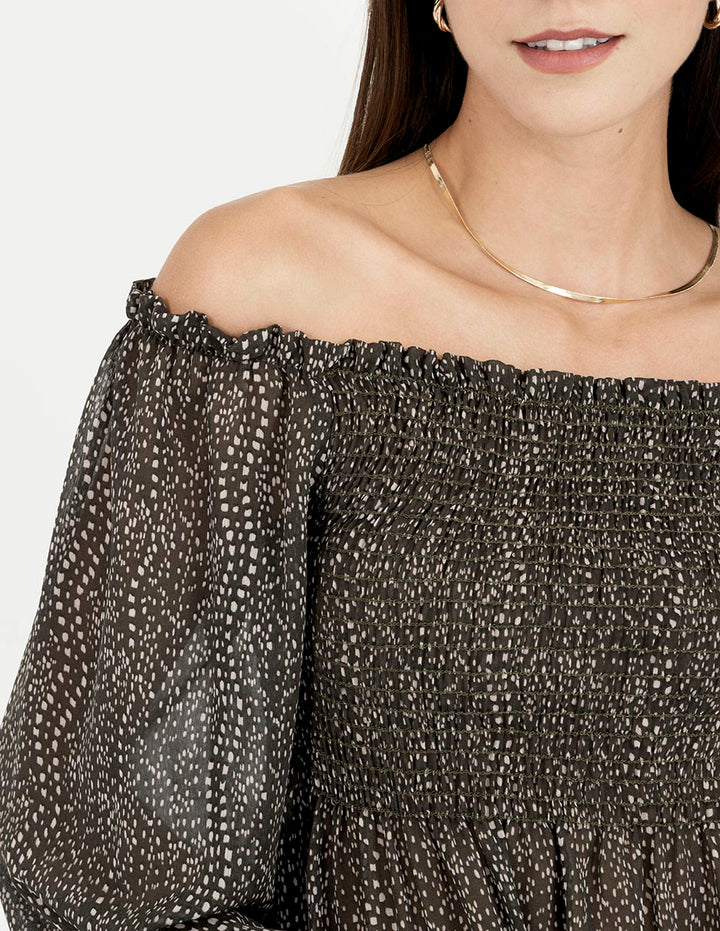Blusa de mesh manga larga off shoulders