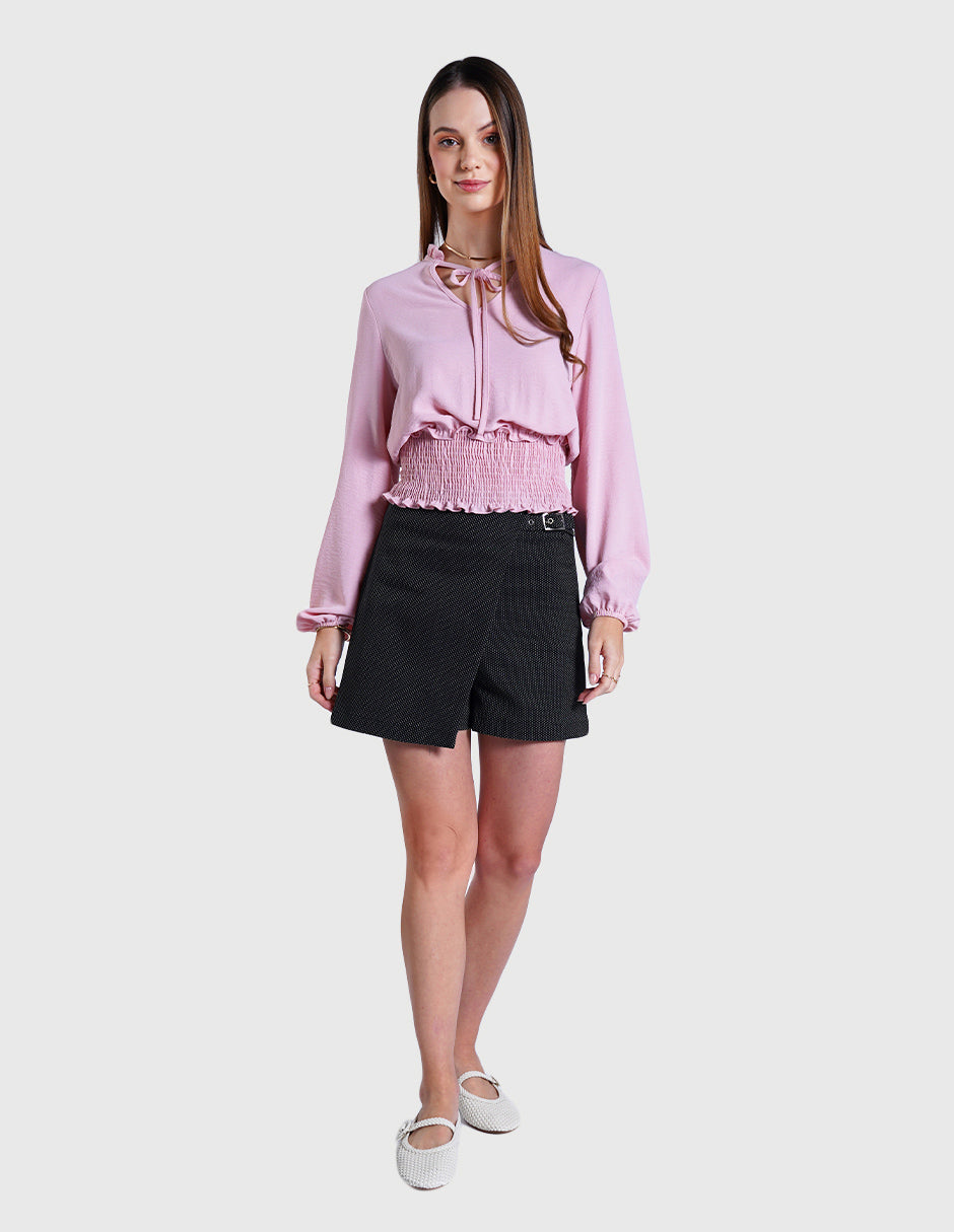 Blusa rosa de manga larga y detalle de smock en la cintura
