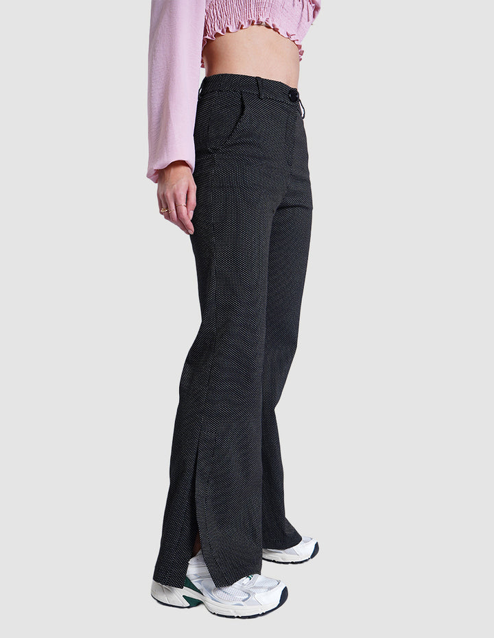 Pantalón de vestir negro con diseño de dots