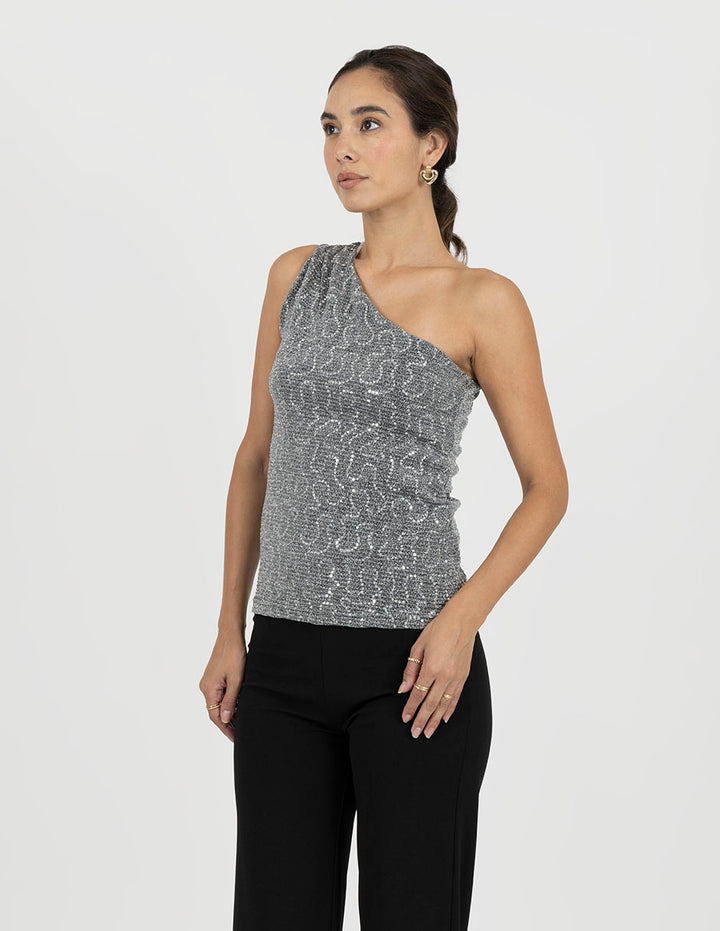 Blusa plateada asimétrica estampada con brillos