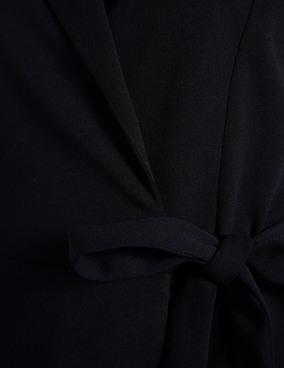Jumpsuit corto con cinta lateral (disponible en negro y rosa)