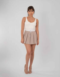 Mini falda beige con detalle de cinta
