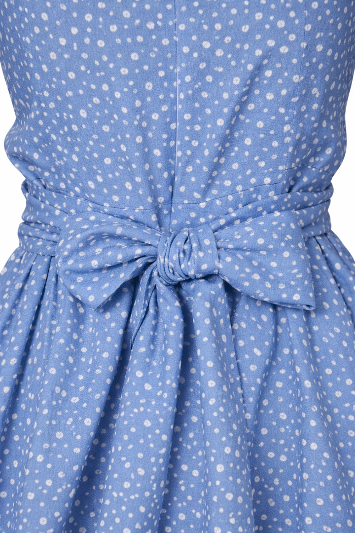 Jumpsuit azul estampado con diseño de moño