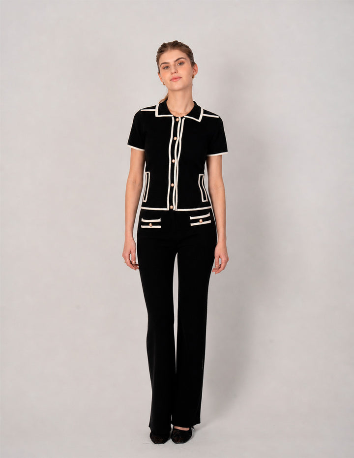Blusa de tejido de puntoo negro con detalles blancos (Conjunto)