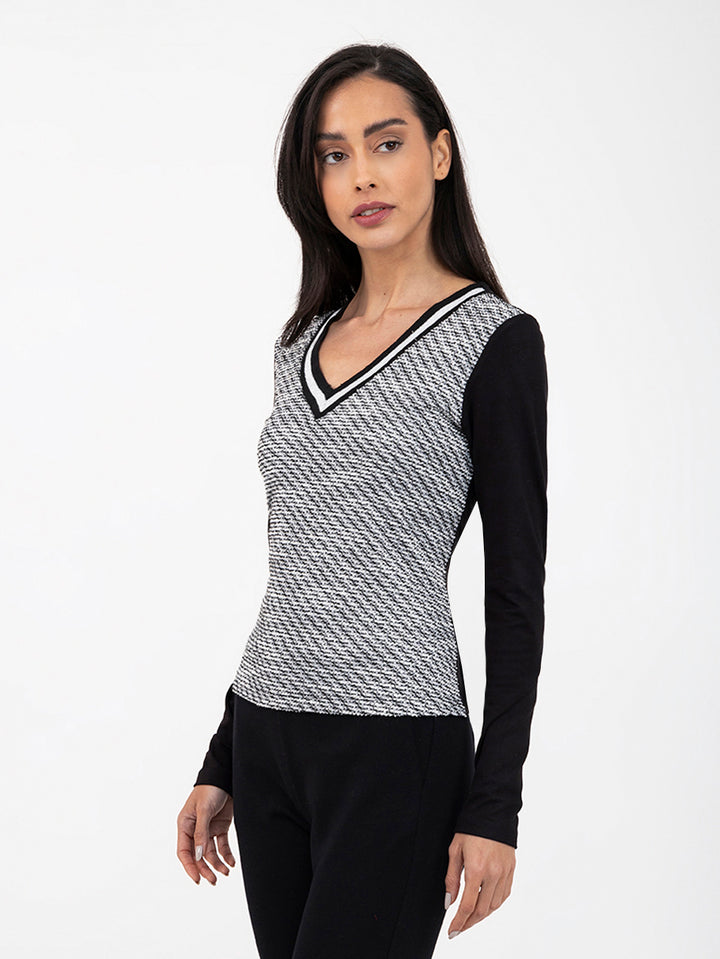 Blusa texturizada de manga larga con escote V