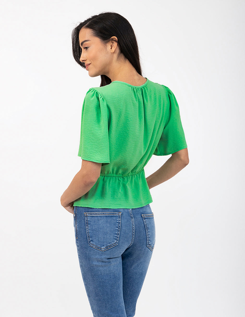 Blusa verde con smock para enmarcar la cintura