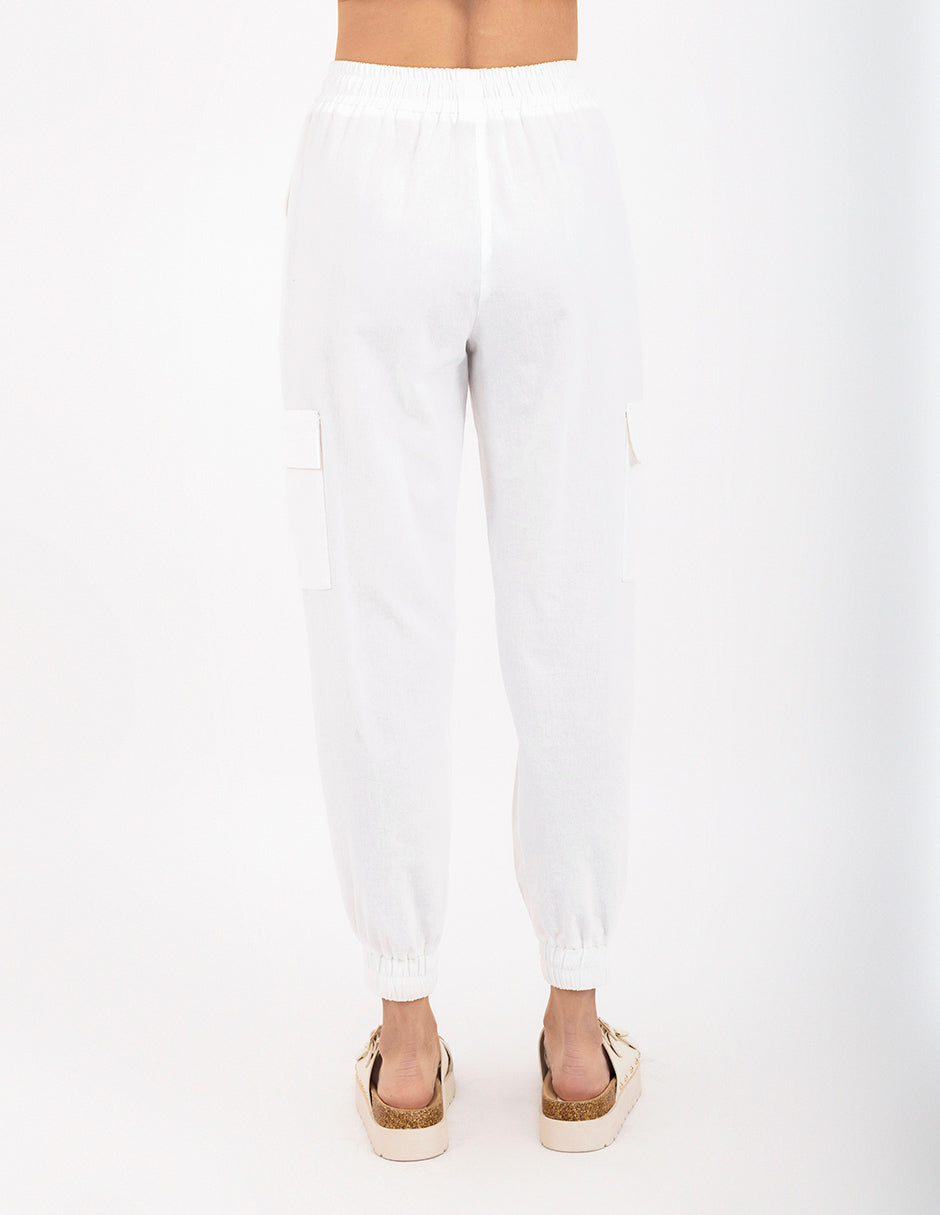 Pantalón de lino con bolsas laterales (disponible en blanco y beige)