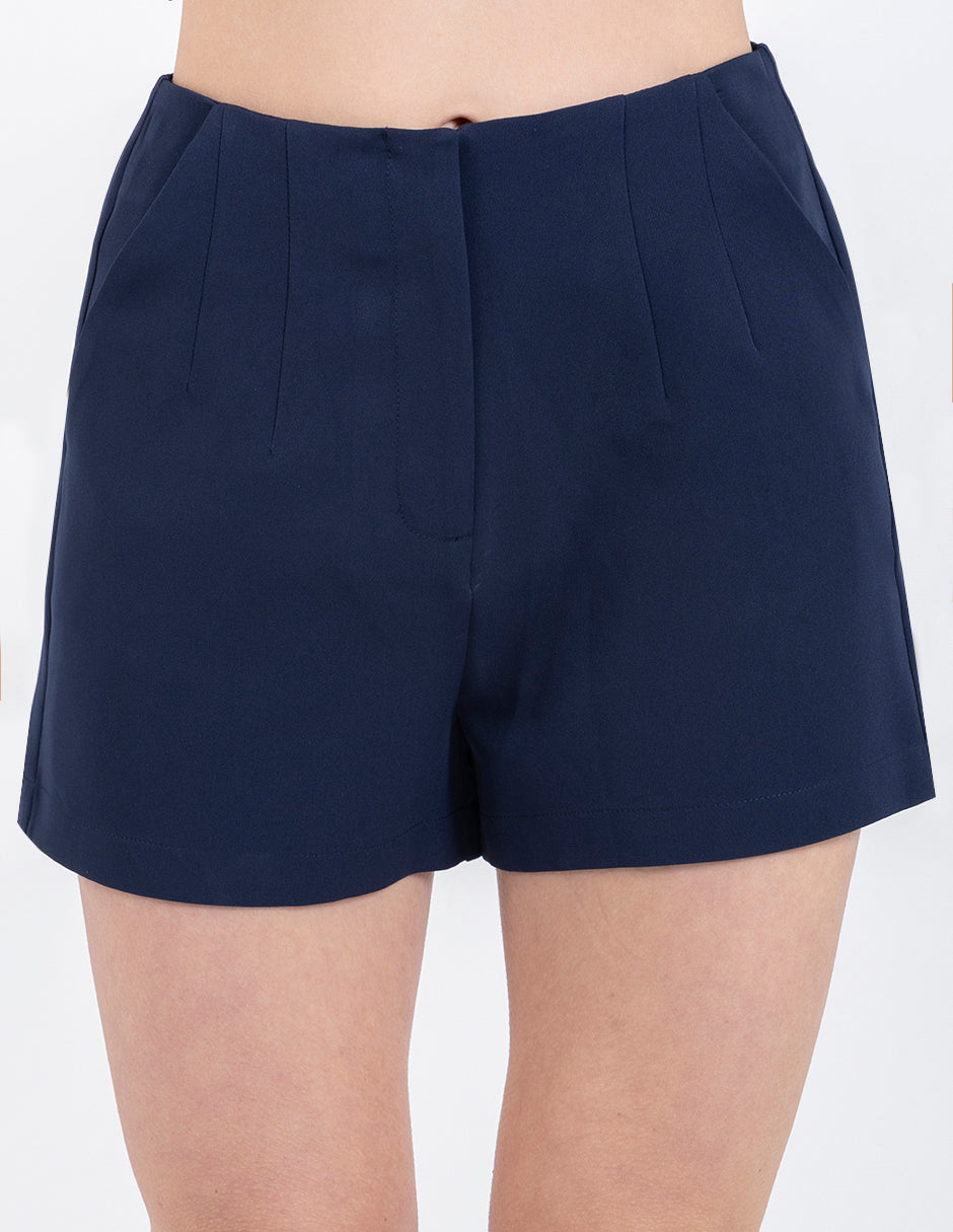 Short corto con bolsas laterales y  pinzas en tela de vestir  (disponible en verde y azul marino)