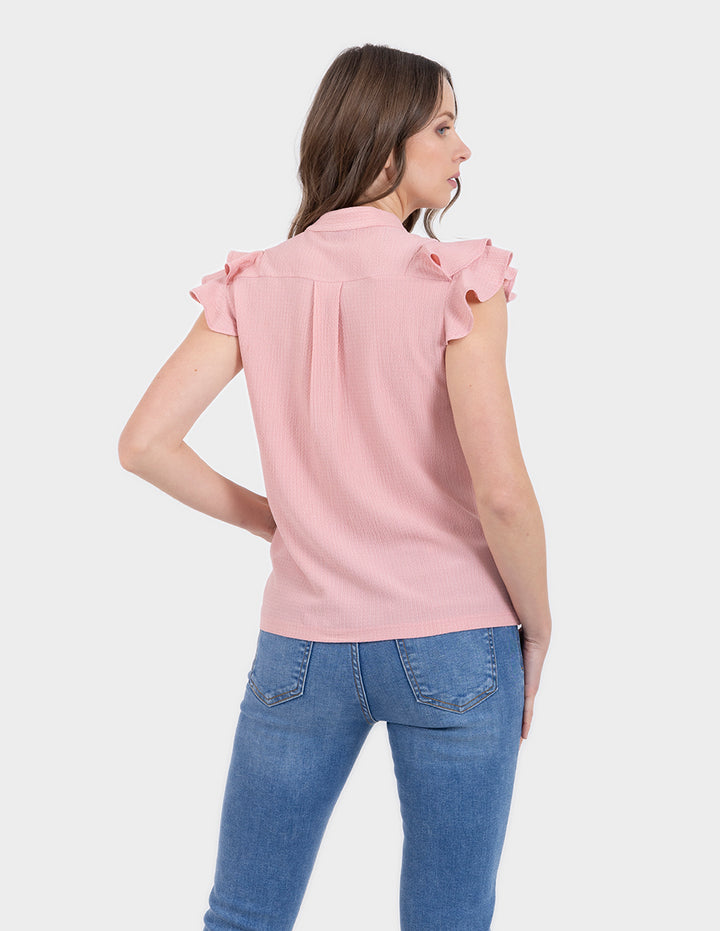 Blusa con manga de escarolas disponible en palo de rosa