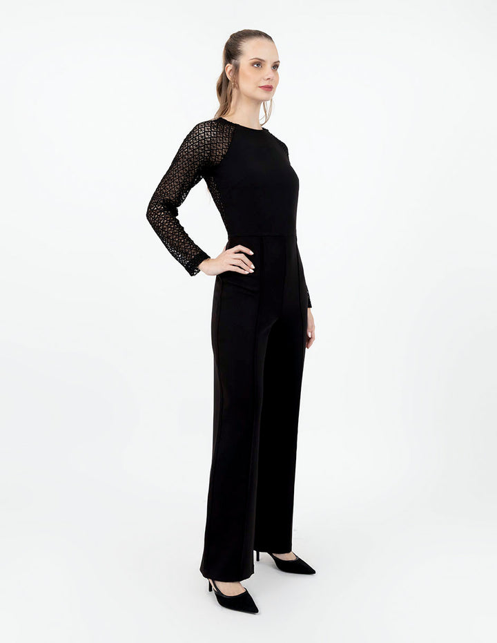 Jumpsuit negro largo con mangas de red