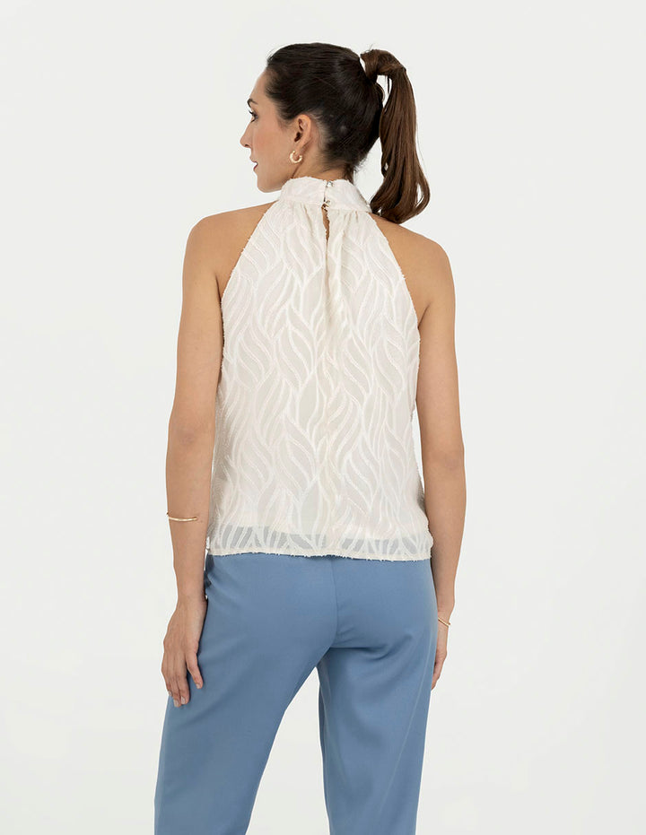 Blusa beige con cuello halter