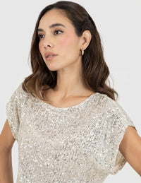 Blusa  beige de lentejuelas y manga corta
