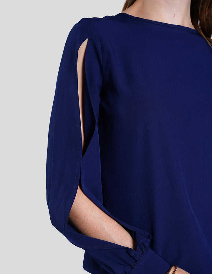 Blusa azul rey con abertura en mangas
