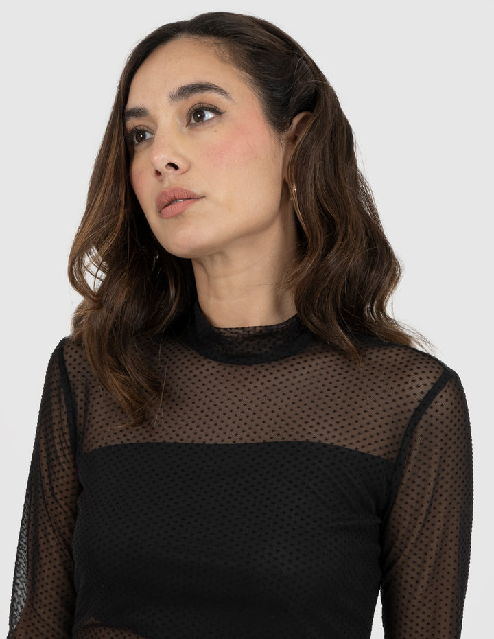 Blusa negra transparente de manga larga