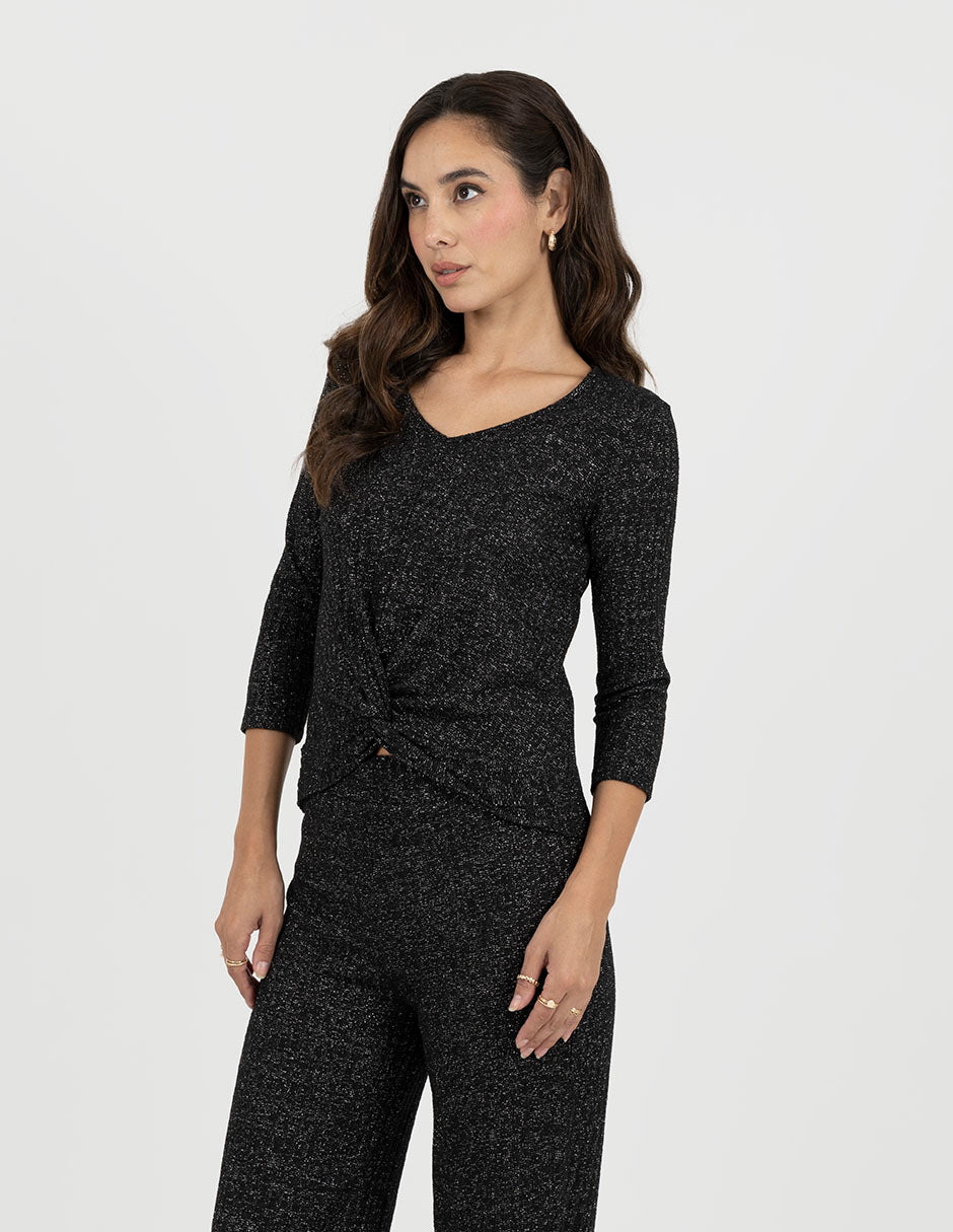 Blusa negra con brillos y manga 3/4