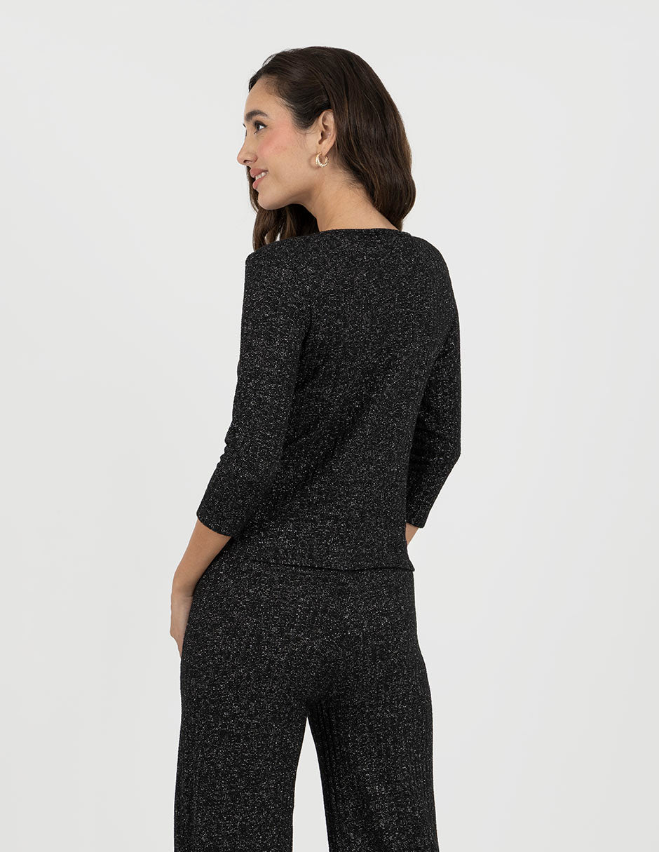 Blusa negra con brillos y manga 3/4