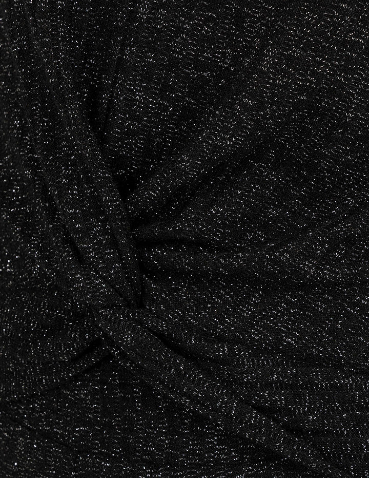 Blusa negra con brillos y manga 3/4