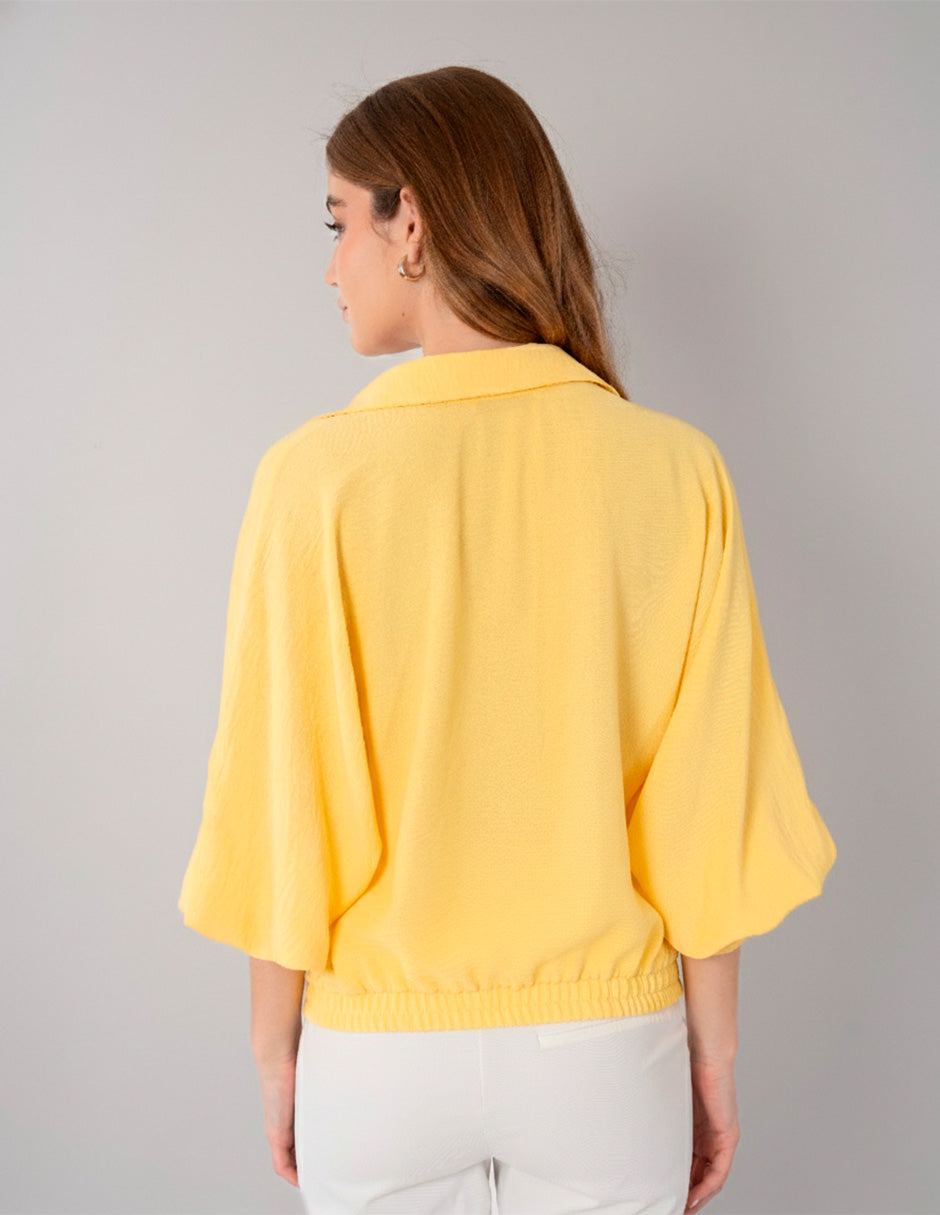 Blusa amarilla de manga larga y escote V