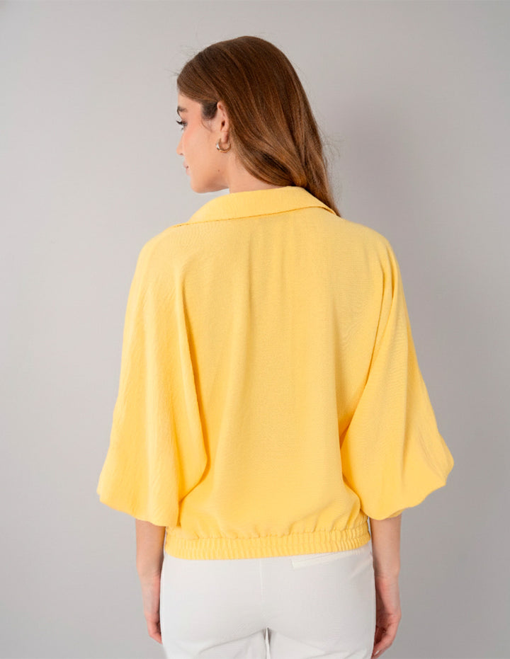 Blusa amarilla de manga larga y escote V