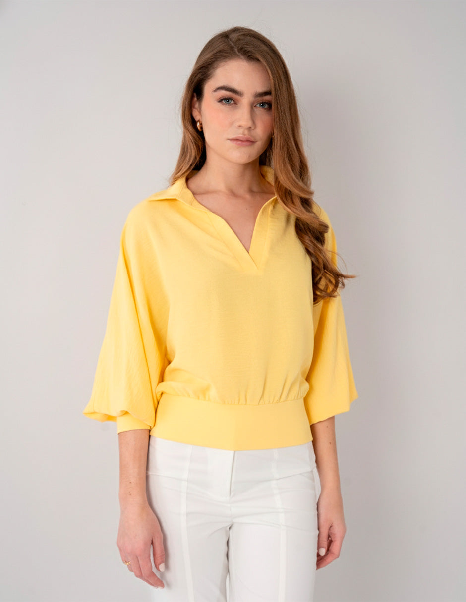 Blusa amarilla de manga larga y escote V