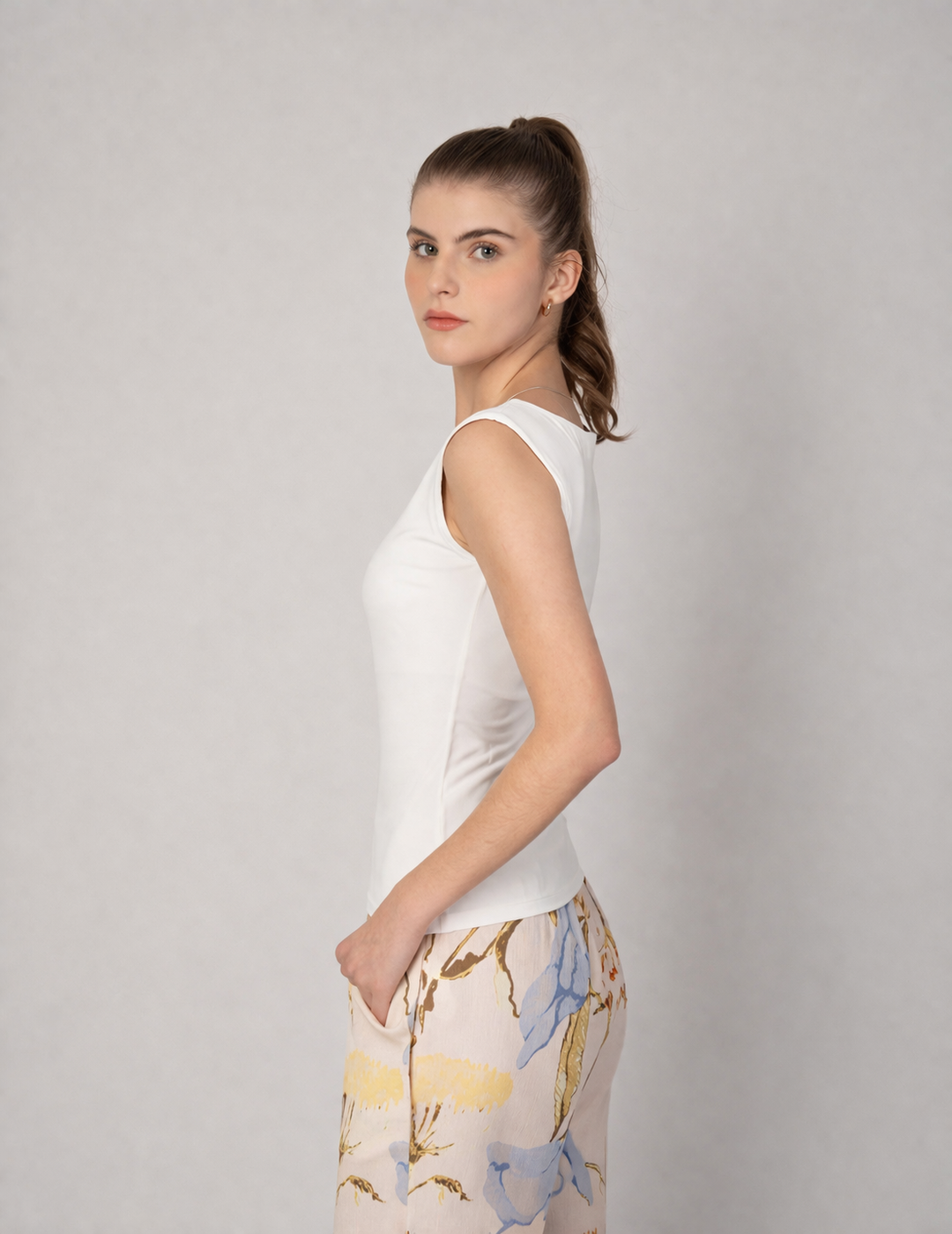 Blusa con diseño de moño en manga (disponible en rosa y blanco)