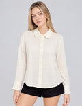 Blusa ivory de vestir y manga larga