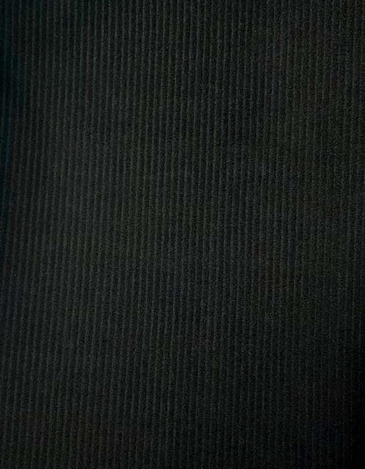 Pantalón negro a la cintura con textura tipo pana