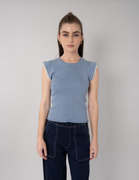 Blusa lisa (disponible en azul y blanco)