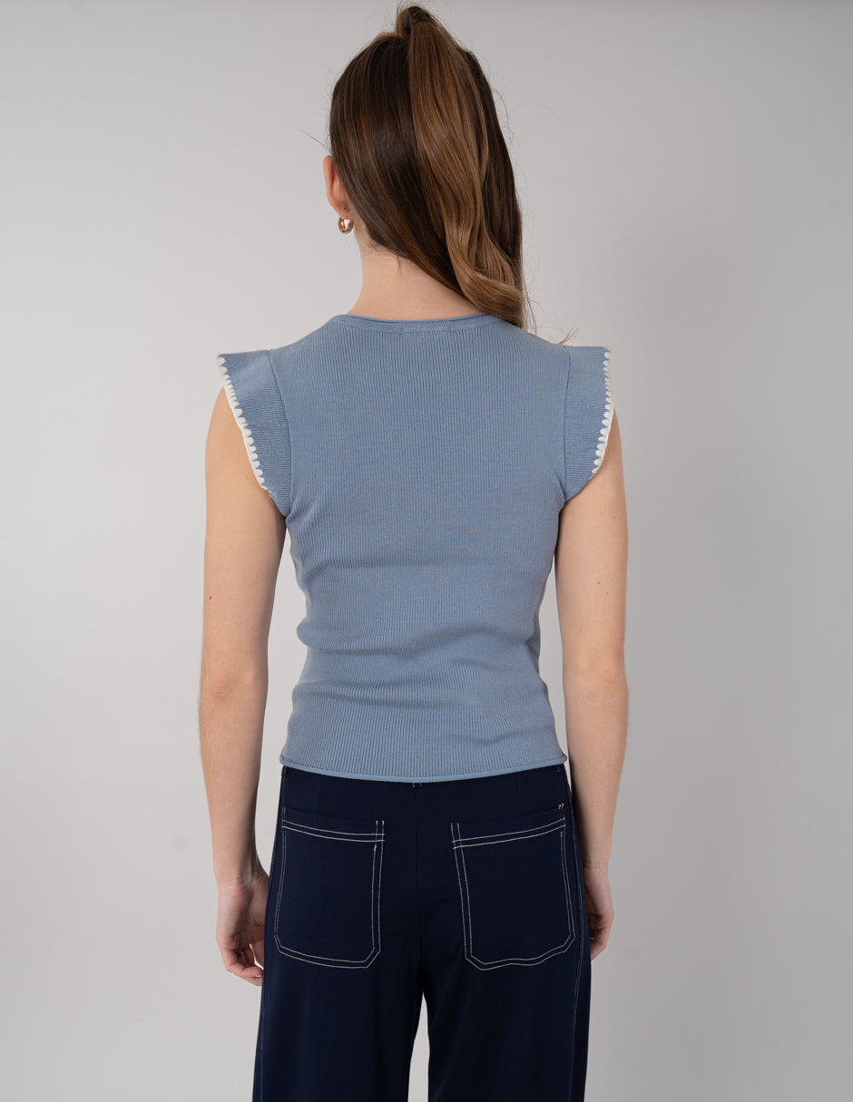 Blusa lisa (disponible en azul y blanco)