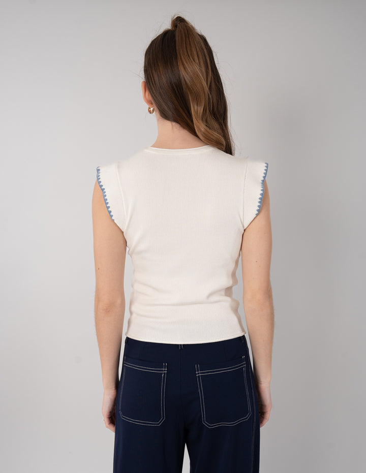 Blusa lisa (disponible en azul y blanco)