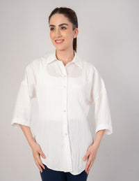 Blusa ivory tipo camisera de mangas 3/4