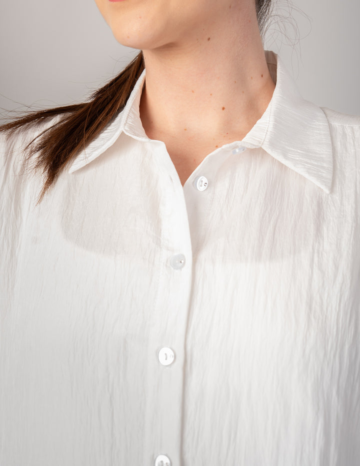 Blusa ivory tipo camisera de mangas 3/4