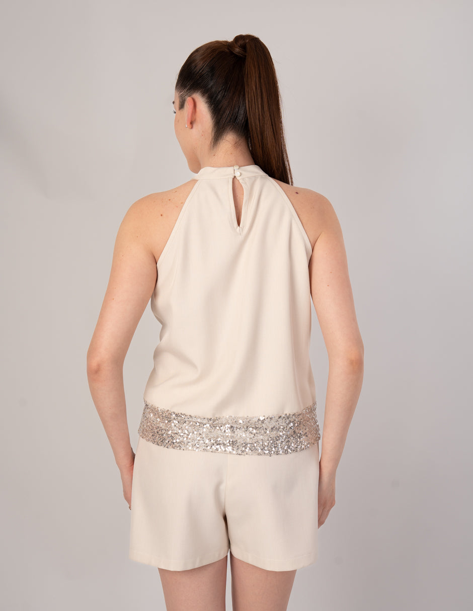 Blusa hueso de cuello alto y detalle de lentejuelas (Conjunto)