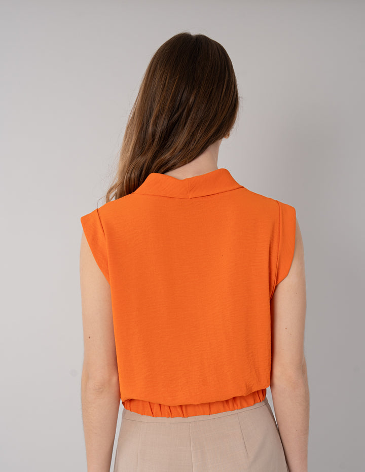 Blusa naranja sin mangas de cuello columpio