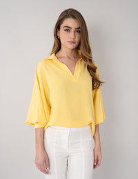 Blusa amarilla de manga larga y escote V