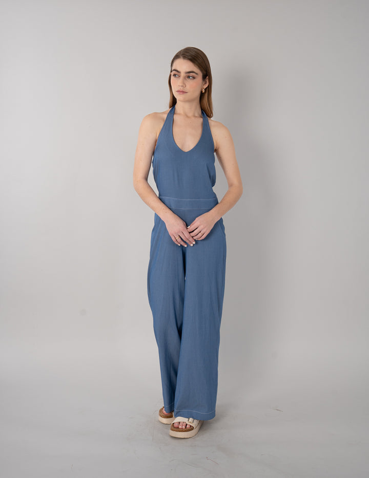 Jumpsuit largo azul con escote pronunciado