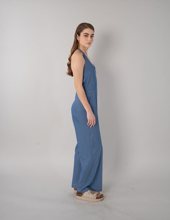 Jumpsuit largo azul con escote pronunciado