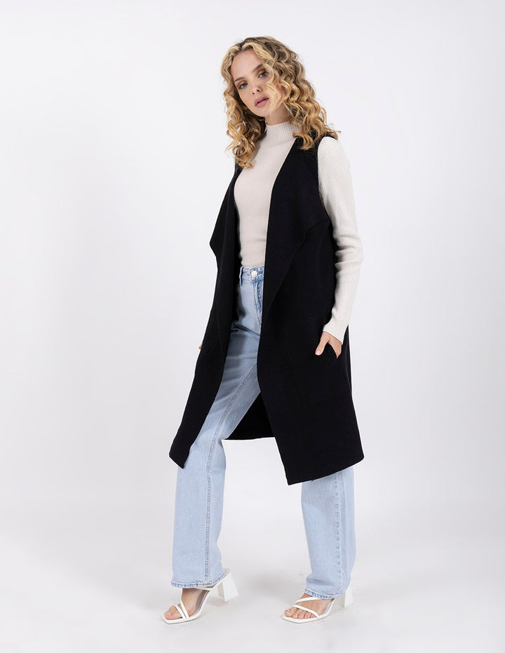 Chaleco largo abierto con bolsas laterales